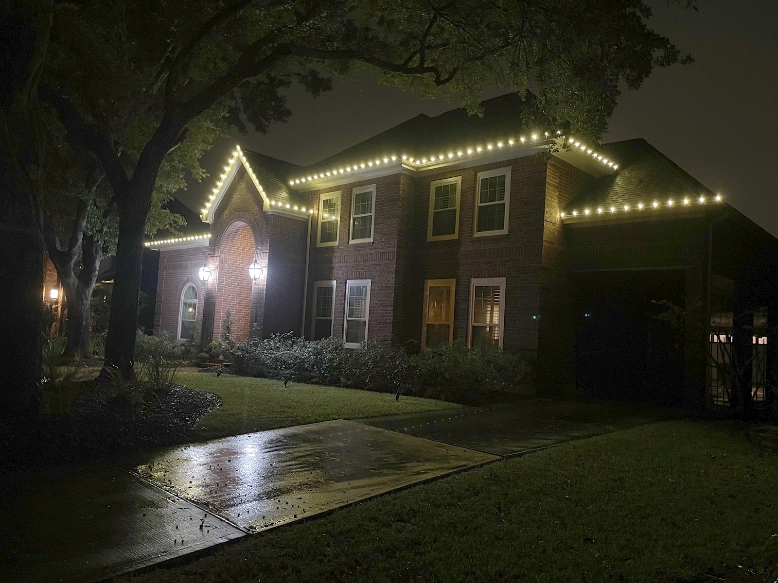 Christmas light installation by Gilly's Lighting Services in First Colony